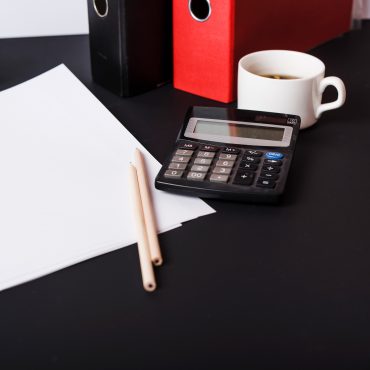 Office desk with calculator